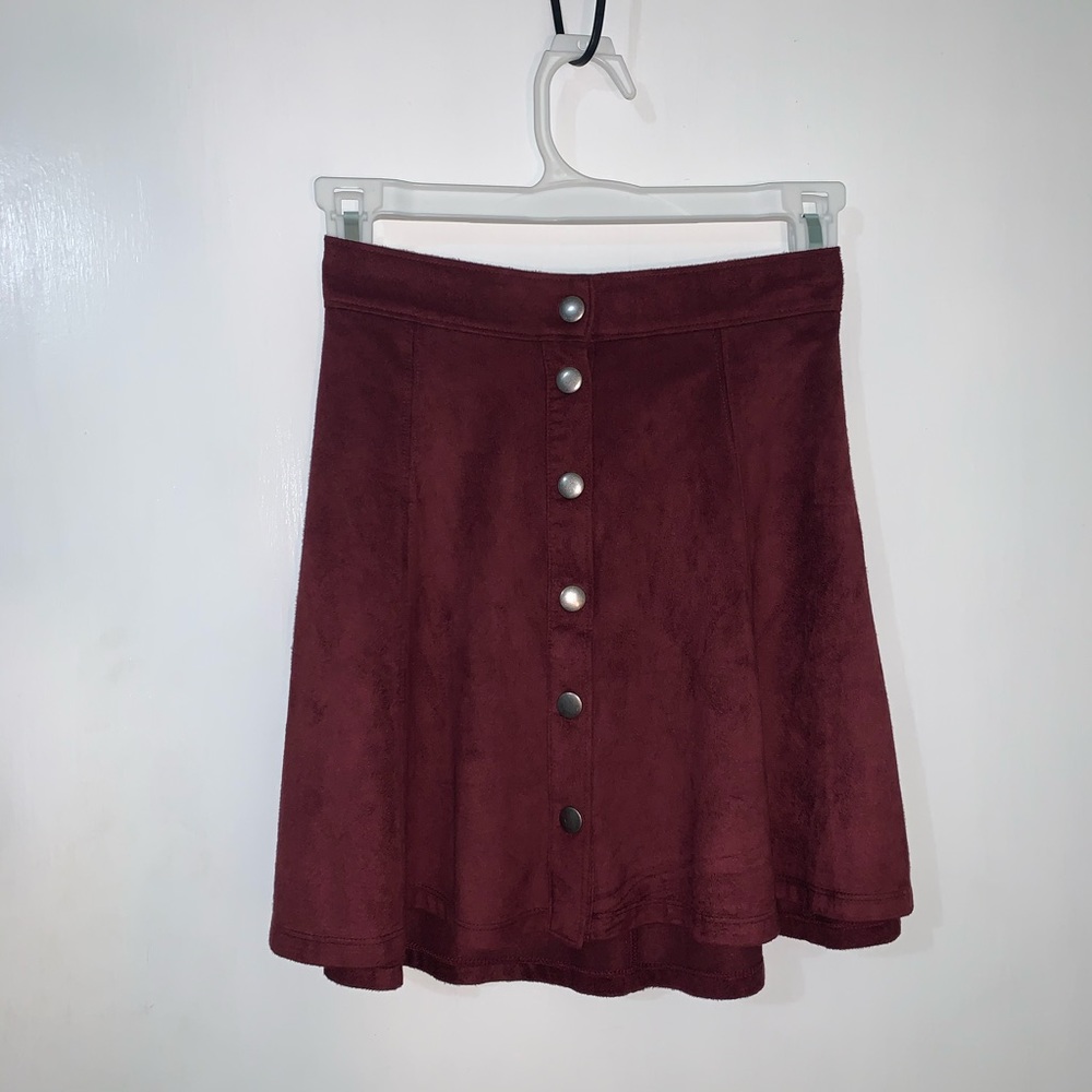 Burgundy button up skirt, suede look fabric.